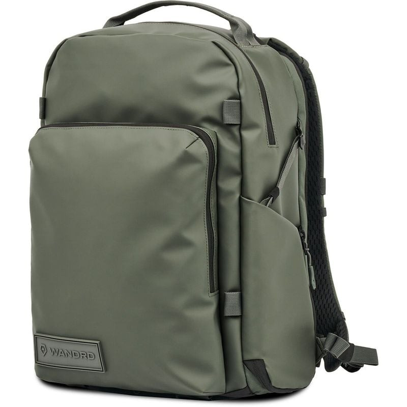 WANDRD PRVKE 31L Pocket Photo Bundle en Wasatch Green, vue latérale montrant poche d'accès appareil 