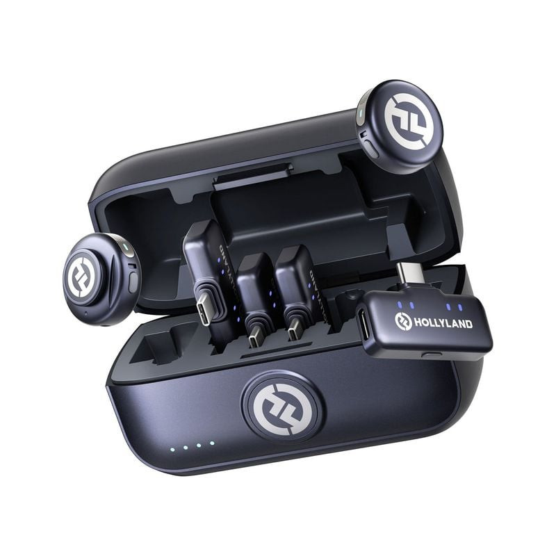 Boîtier de charge Hollyland Lark M3 ouvert contenant deux émetteurs à clip et quatre récepteurs USB-