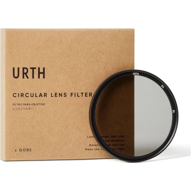 Filtre polarisant circulaire Urth 86 mm à côté de sa boîte en papier kraft, montrant l'effet de la l
